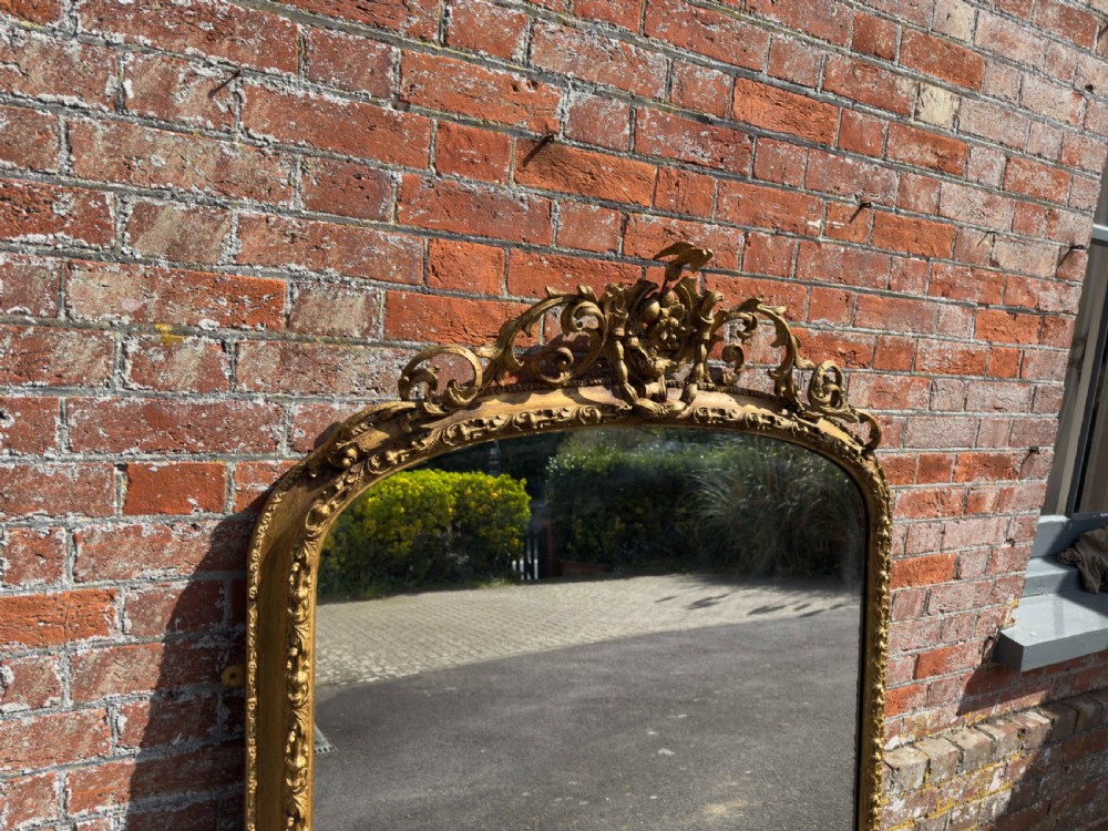 A Stunning large Antique English 19th Century carved wood & gesso arched top gilt Overmantle Mirror. View V