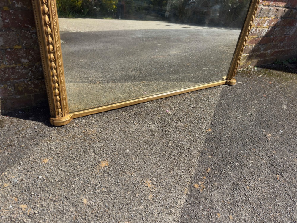 A Spectualar Large Antique English 19th Century carved wood & gesso arched top gilt Tulip framed Overmantel Mirror. View III