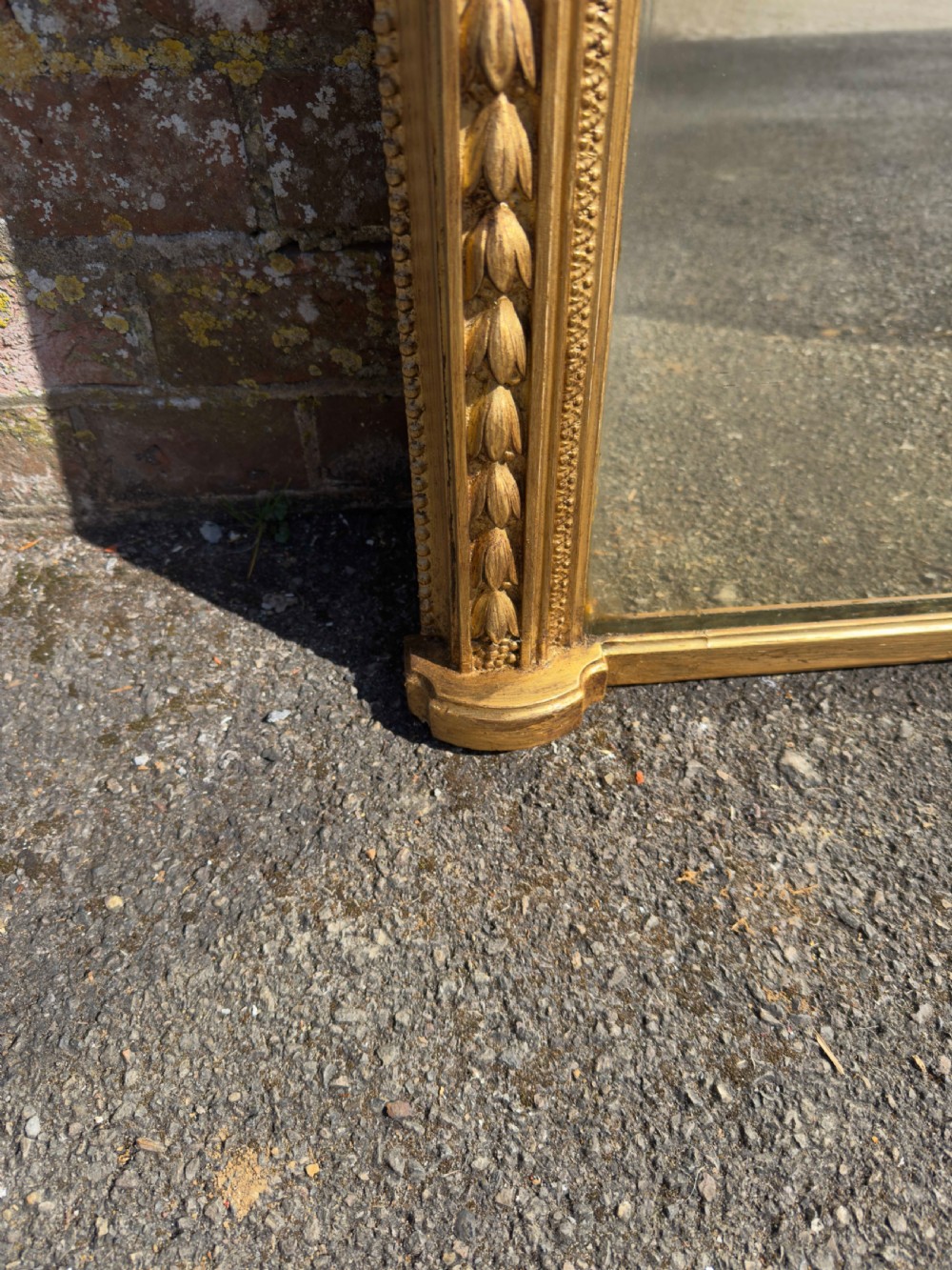 A Spectualar Large Antique English 19th Century carved wood & gesso arched top gilt Tulip framed Overmantel Mirror. View IV