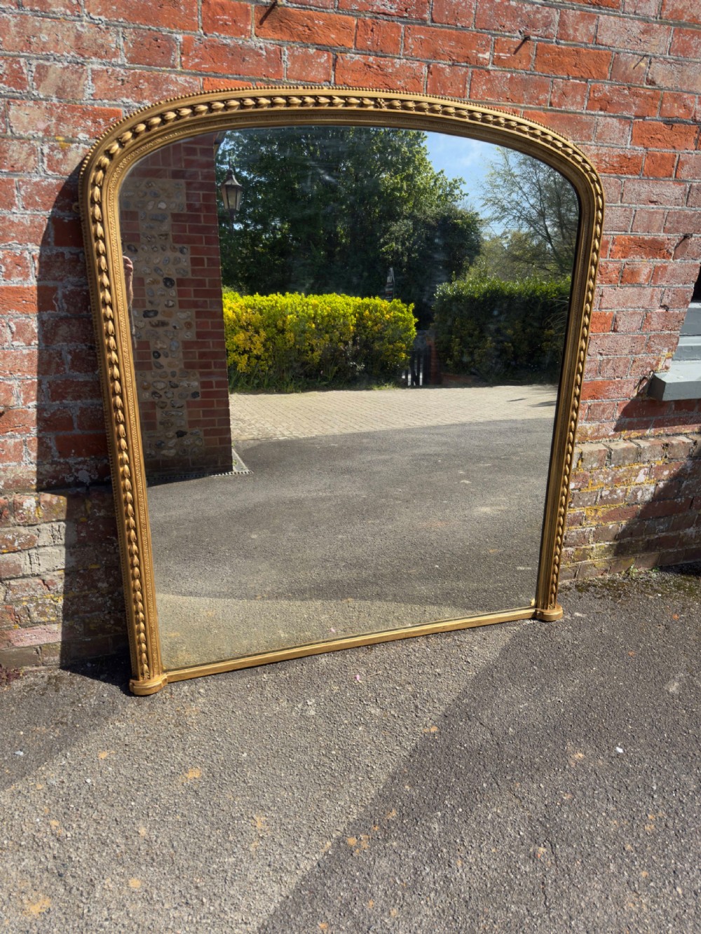 A Spectualar Large Antique English 19th Century carved wood & gesso arched top gilt Tulip framed Overmantel Mirror. View VI