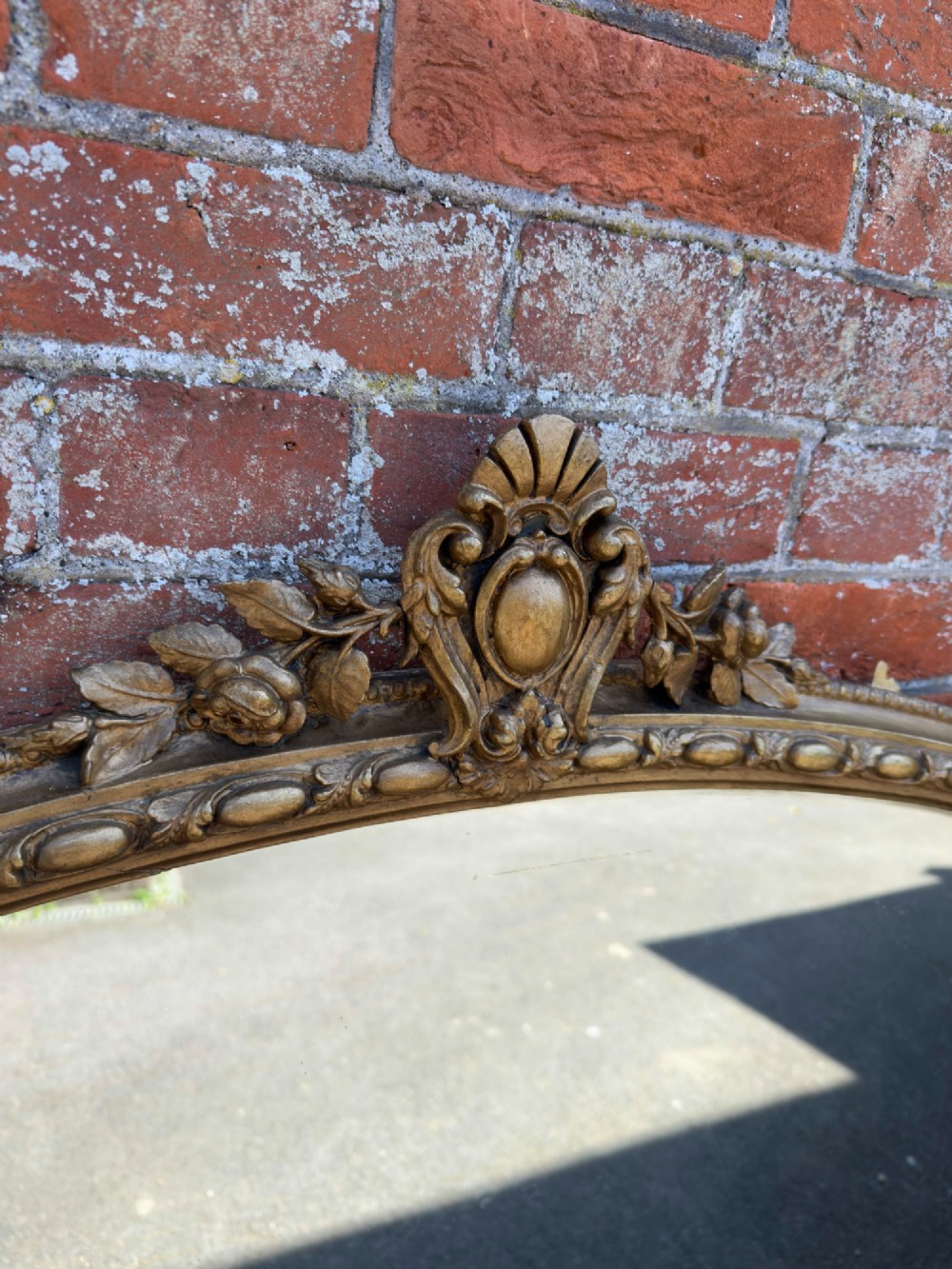 A Fabulous large Antique English 19th Century carved wood & gesso shaped top gilt Overmantle Mirror. View VI