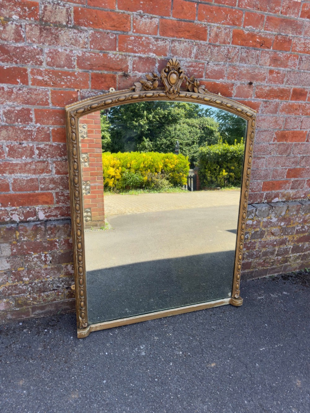 A Fabulous large Antique English 19th Century carved wood & gesso shaped top gilt Overmantle Mirror. View VII