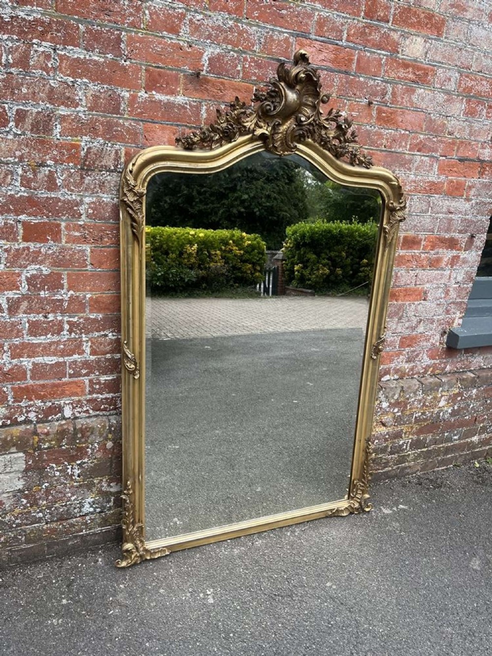 A Spectacular large Antique French 19th Century French carved wood & gesso shaped top gilt Mirror