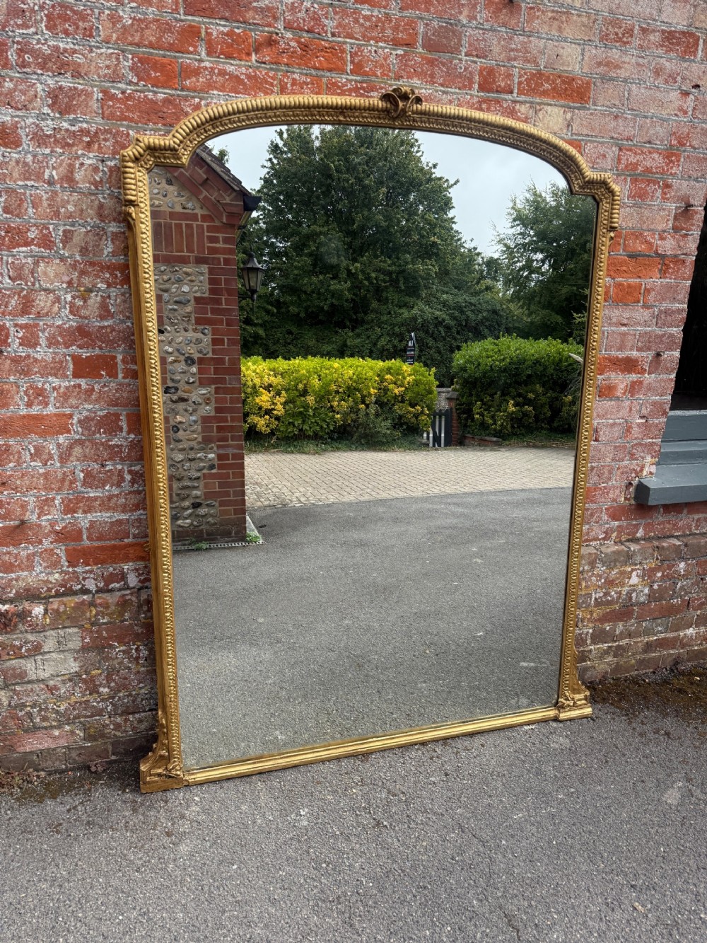 A Superb large Antique English 19th Century carved wood & gesso painted ribbed framed shaped top Mirror.