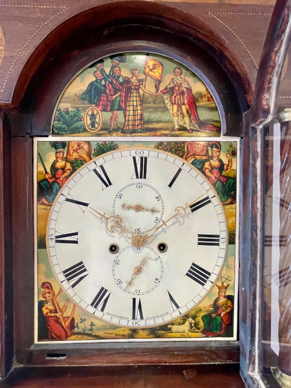 An antique Scottish Georgian mahogany longcase clock featuring a hand-painted dial, spiral turned columns, and marquetry inlay. View XV