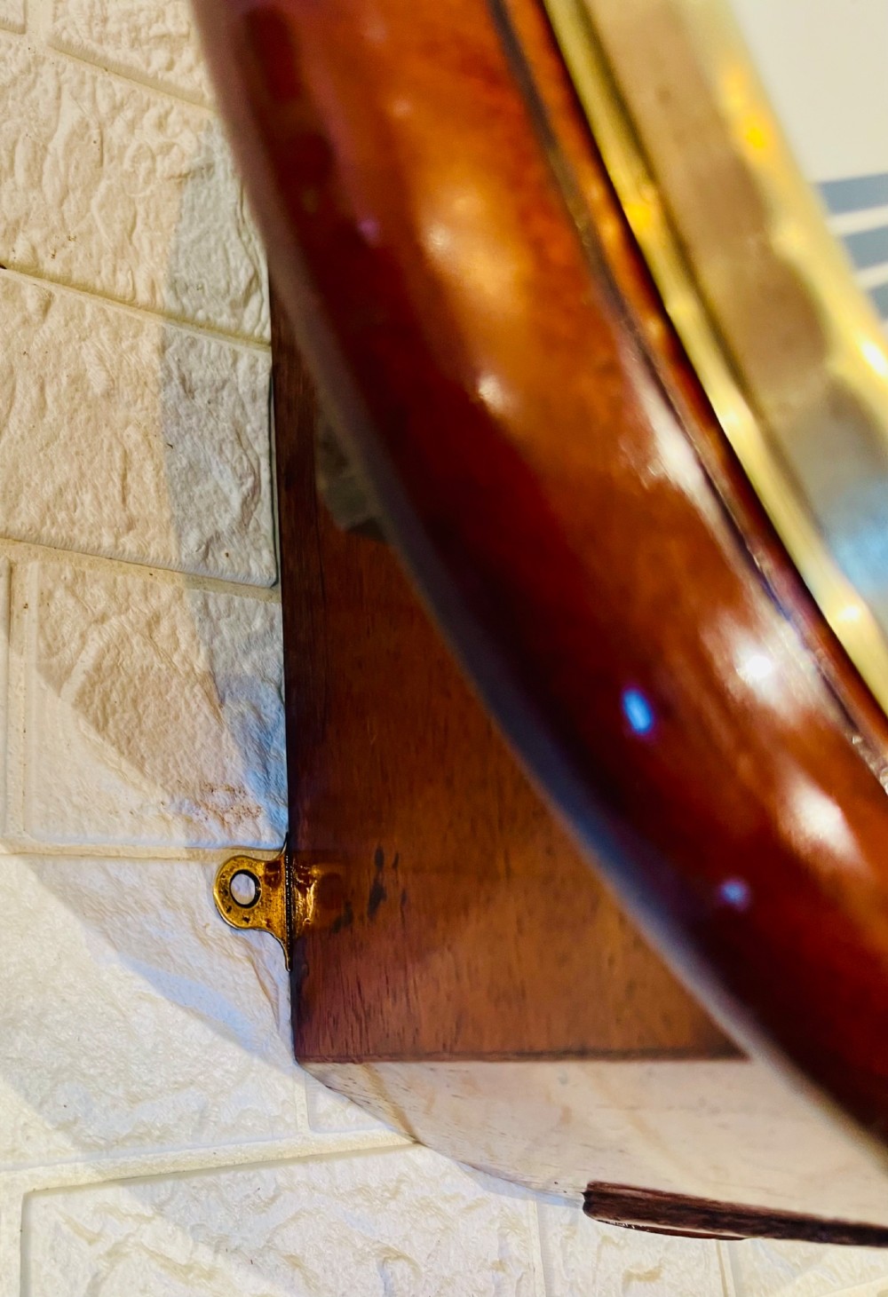 A circular mahogany fusee wall clock featuring a white dial face with black Roman numerals, brass bezel, and J. W. Benson London markings. View VIII
