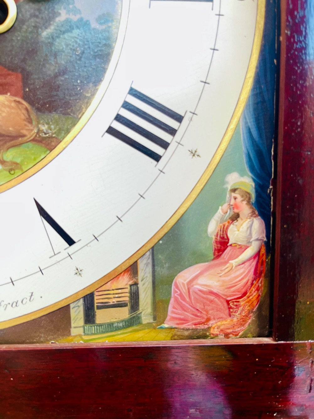 A tall Regency mahogany longcase clock featuring a swan-neck hood pediment, brass finial, fluted columns, and a hand-painted dial with figurative scenes. View XII
