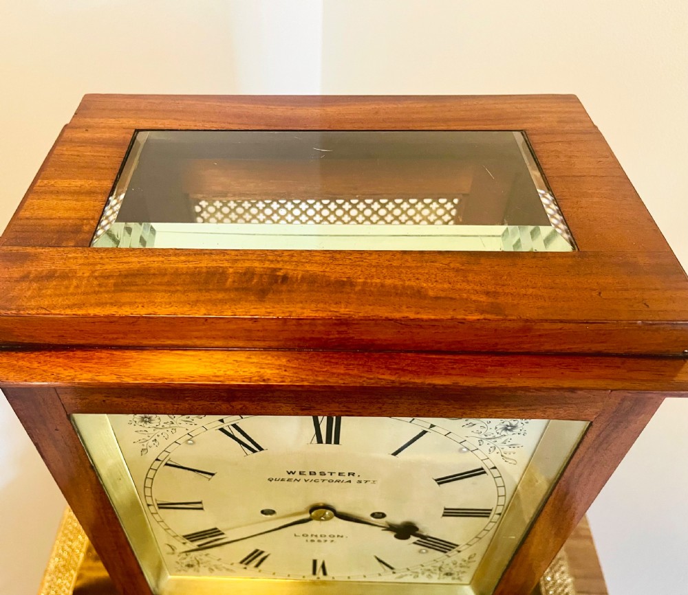 A Victorian mahogany four-glass bracket clock featuring a white dial with Roman numerals and a moulded stepped base. View VIII