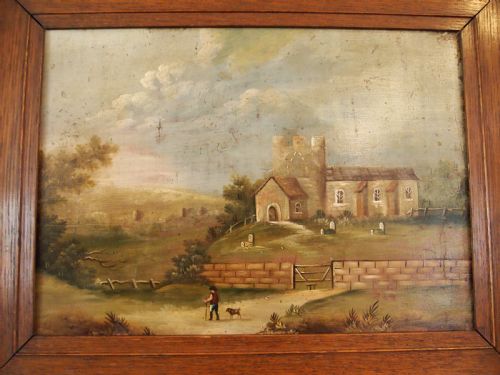 fig 1. A 19th-century naive oil painting on board depicting a rural church scene with a figure walking a dog, set within a wide wooden frame.