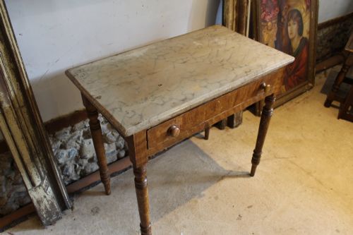 fig 1. A mid-19th-century Victorian side table with a single drawer, turned legs, turned wooden knobs, and an authentic warm brown scumble glaze finish.
