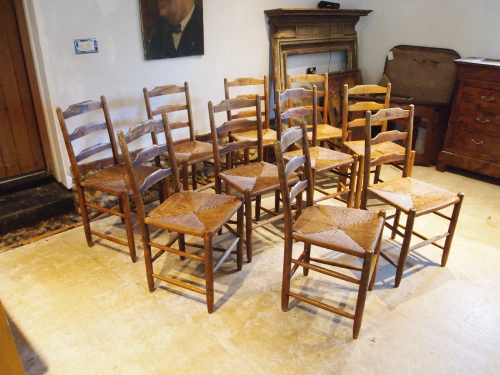 Chairs rare set of 10 Arts and Crafts Gardiner Clissett chairs c1910