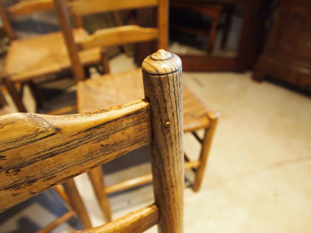 Chairs rare set of 10 Arts and Crafts Gardiner Clissett chairs c1910 View III