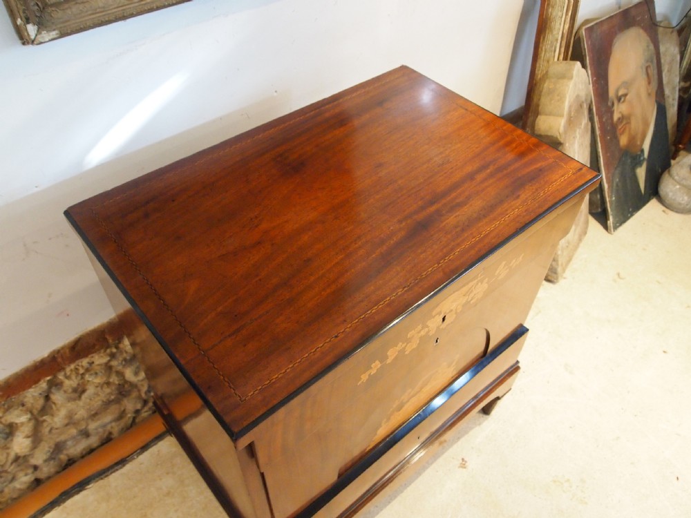 A warm brown Italian timber commode featuring decorative botanical marquetry inlays, two drawers, and square tapered feet. View XII