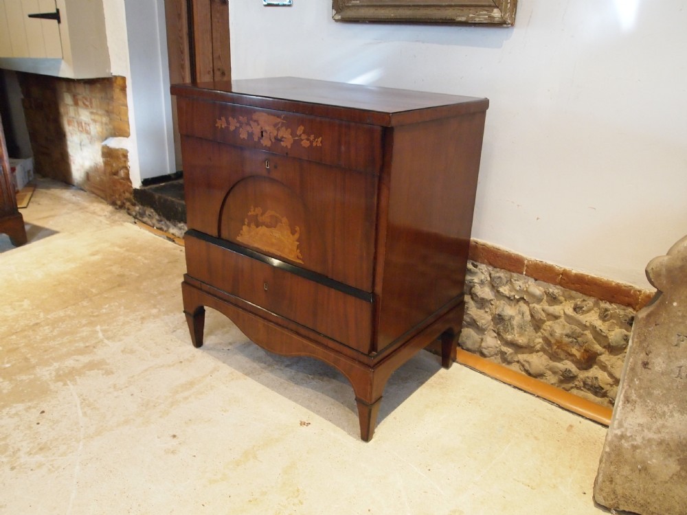 A warm brown Italian timber commode featuring decorative botanical marquetry inlays, two drawers, and square tapered feet. View XIV