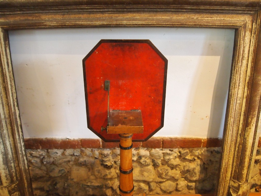 An octagonal Regency satinwood tilt-top table featuring hand-painted floral artwork on a slender turned column and tripod base. View IX