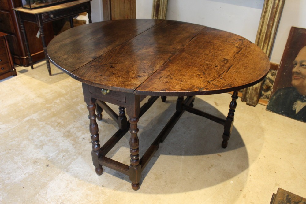 Table refectory farmhouse dining 18th century Oak gateleg c1710 View II