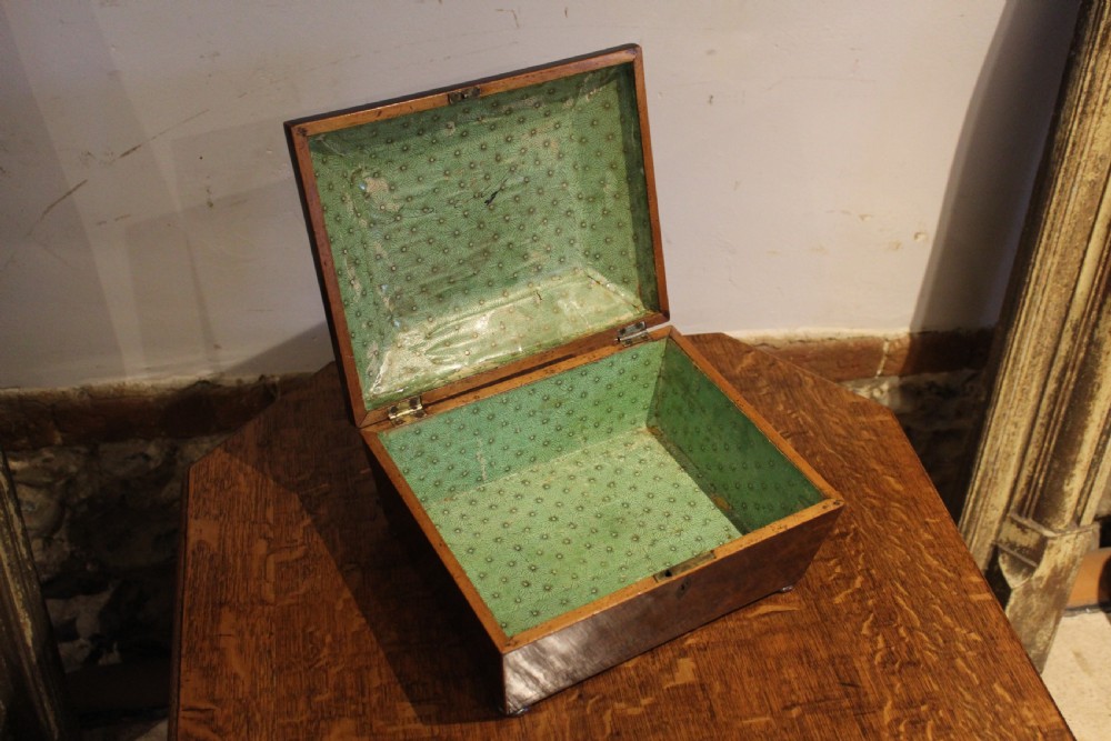 A nineteenth-century Regency period burr yew wooden jewellery box with geometric marquetry banding and a diamond escutcheon. View X