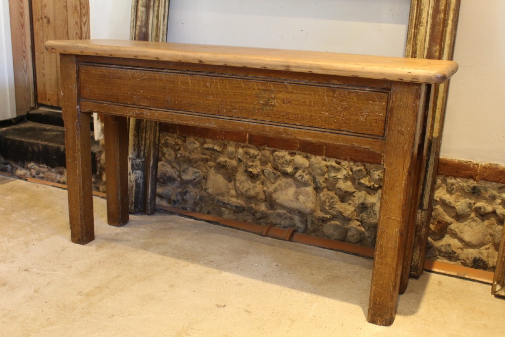 A Victorian wooden console table featuring a light pine top set upon a dark oak frame with square legs. View III