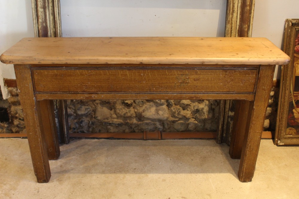 A Victorian wooden console table featuring a light pine top set upon a dark oak frame with square legs. View VII