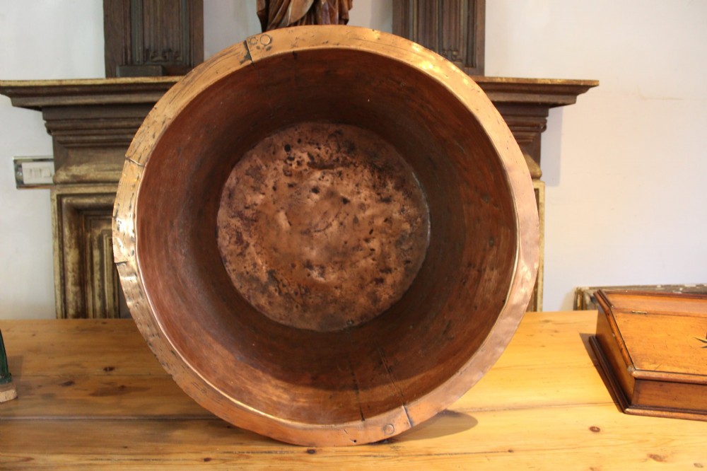 A large nineteenth-century Victorian copper vessel featuring a flared rolled rim and a hand-riveted vertical seam. View III