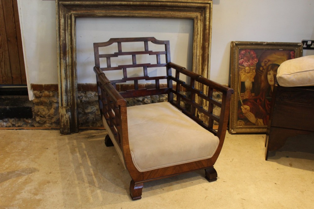 An Art Deco solid walnut armchair featuring grid-pattern side panels, squared feet, and beige suede seat and back cushions. View VIII