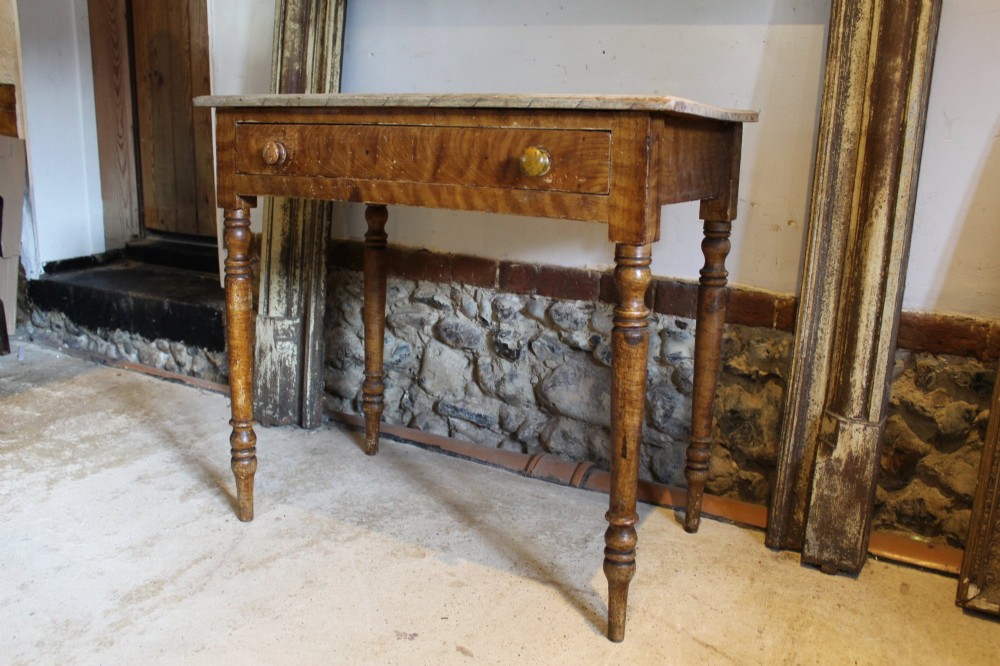 A mid-19th-century Victorian side table with a single drawer, turned legs, turned wooden knobs, and an authentic warm brown scumble glaze finish. View IV