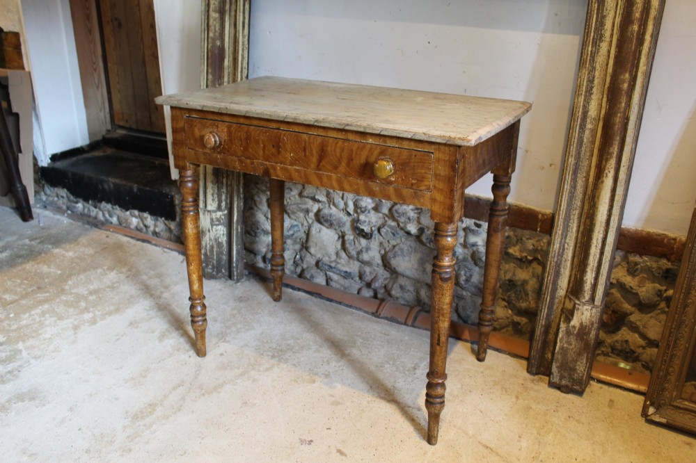 A mid-19th-century Victorian side table with a single drawer, turned legs, turned wooden knobs, and an authentic warm brown scumble glaze finish. View IX