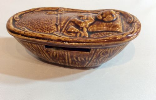 RARE TREACLE GLAZE FRENCH MONEY BANK IN THE FORM OF A CHILD IN BED - ADDITIONAL PHOTO 1
