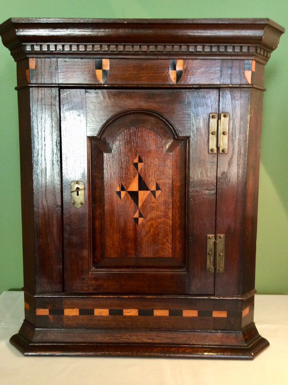 Small 19th Century Oak Corner Cupboard with geometric  marquetry inlay