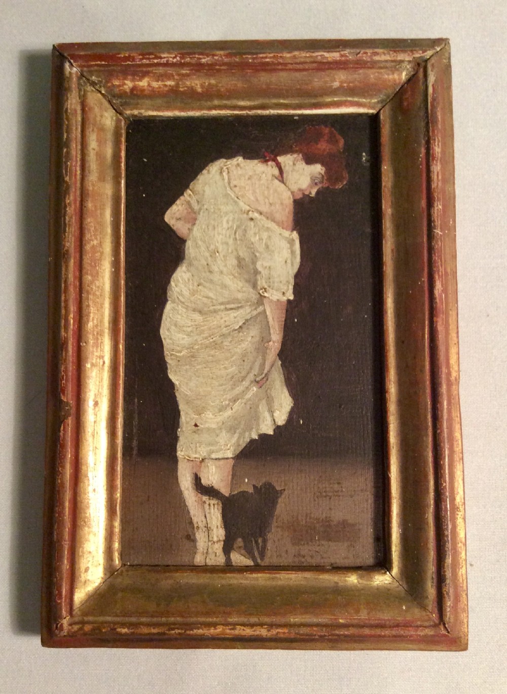 Charming little painting of a lady and her cat 