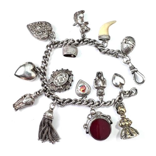 fig 1. Victorian Silver Charm Bracelet with Tassel, Fobs, Egg, Hearts