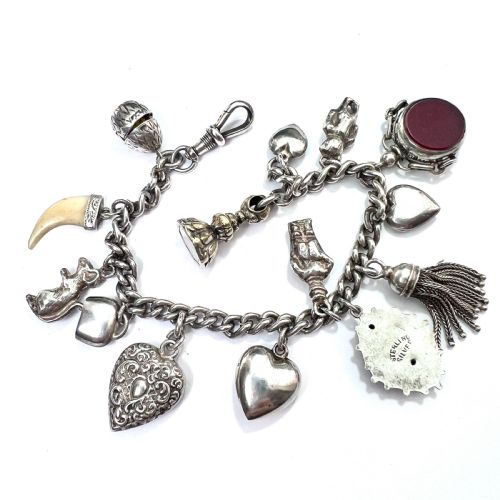 fig 2. Victorian Silver Charm Bracelet with Tassel, Fobs, Egg, Hearts