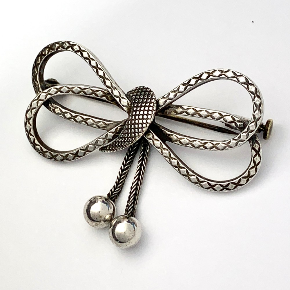 Victorian Silver Bow Brooch with Tassels View IV