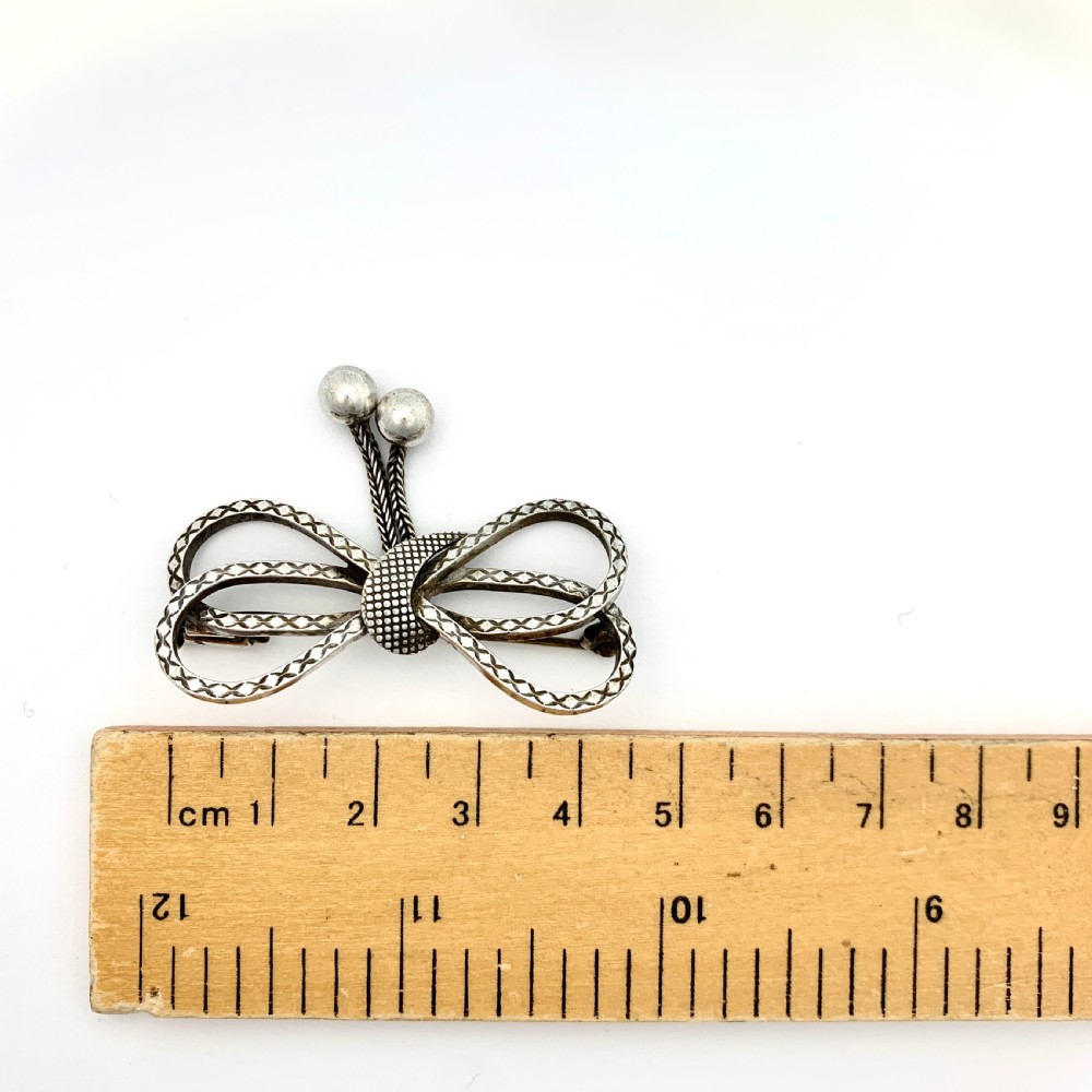 Victorian Silver Bow Brooch with Tassels View V