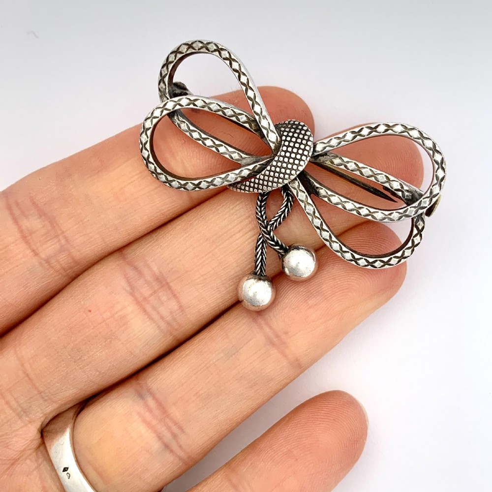 Victorian Silver Bow Brooch with Tassels View VII