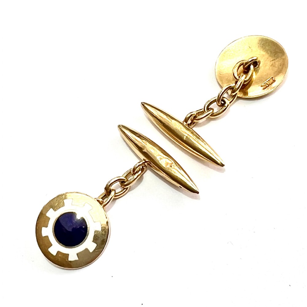 A pair of antique 18ct yellow gold chain-link cufflinks featuring circular faces decorated with central blue enamel discs surrounded by white enamel borders and connected to torpedo-shaped backs. View II