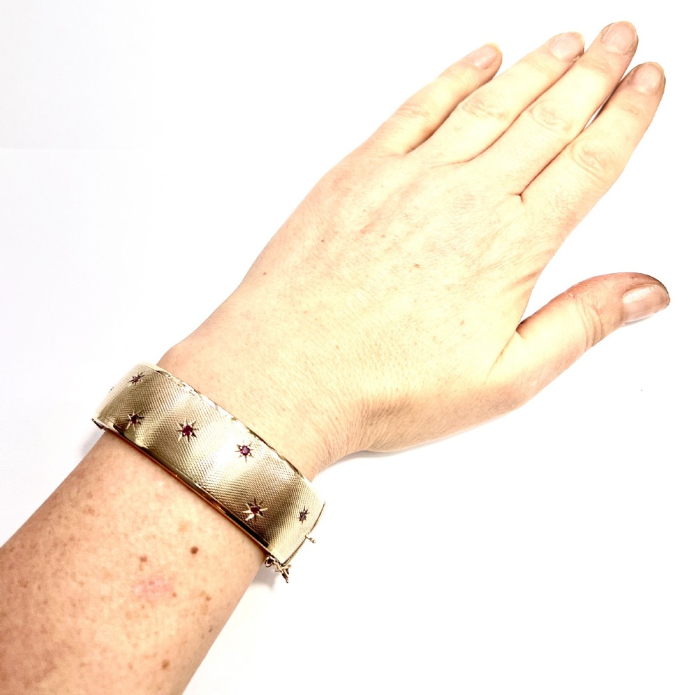 Vintage 1961 Ruby Star Gold Bangle by Cropp & Farr View VI