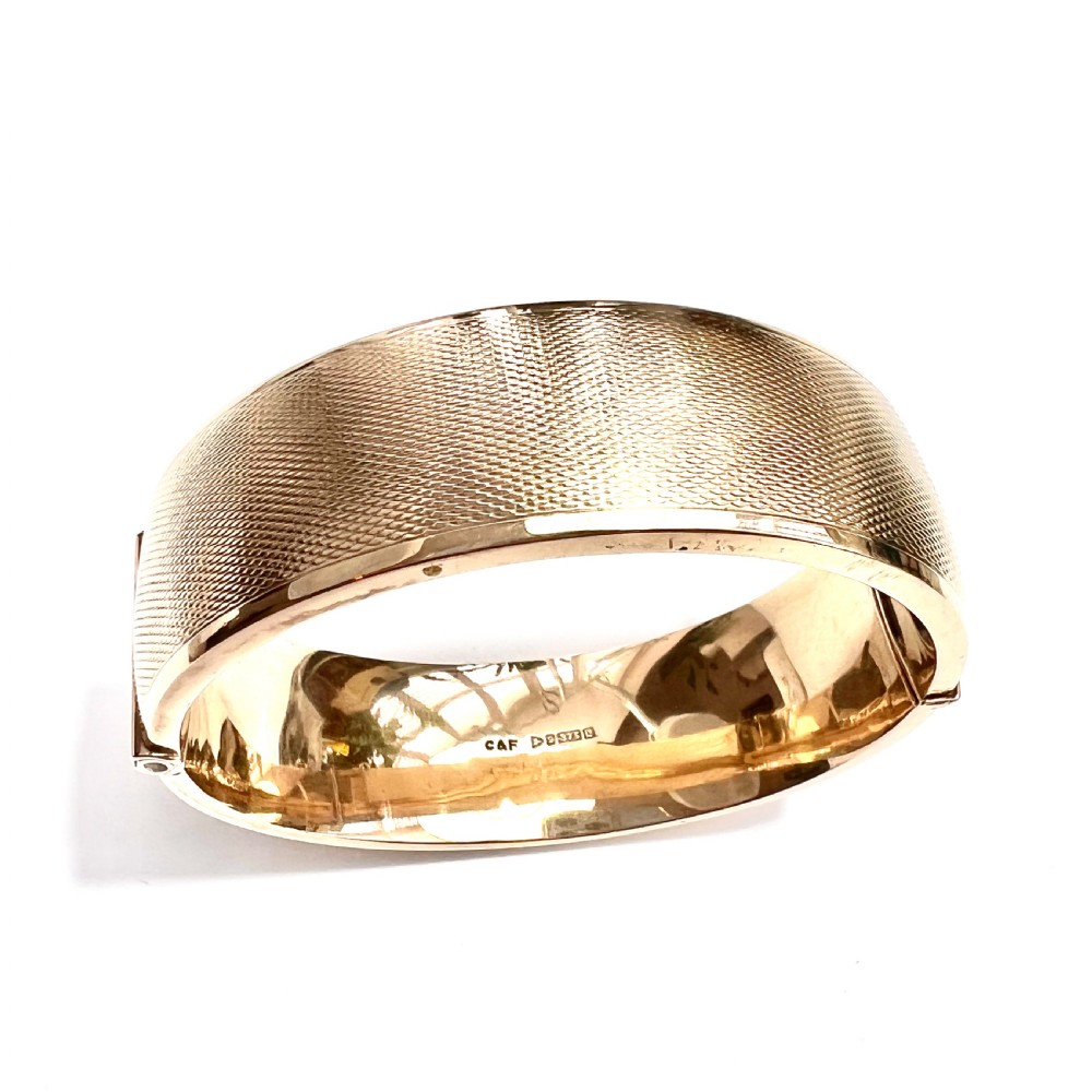Vintage 1961 Ruby Star Gold Bangle by Cropp & Farr View VIII