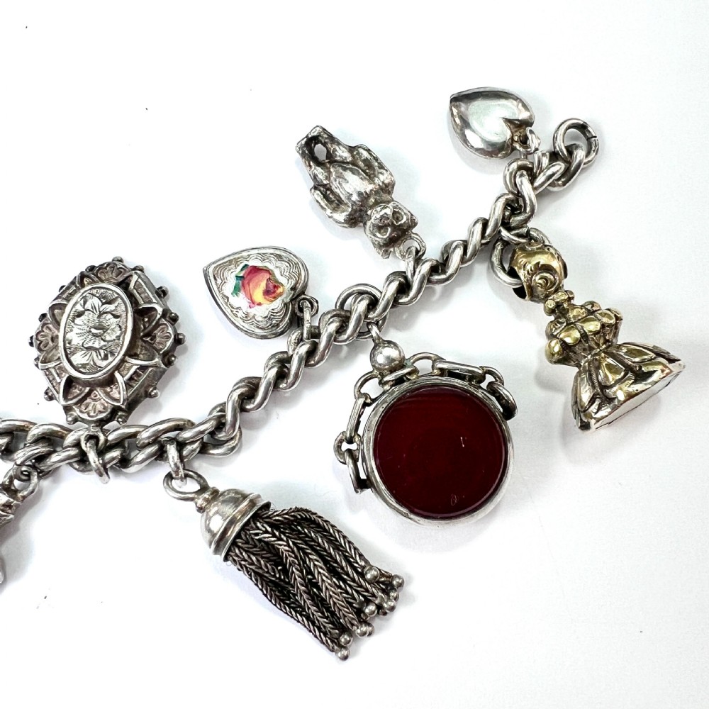 Victorian Silver Charm Bracelet with Tassel, Fobs, Egg, Hearts View V