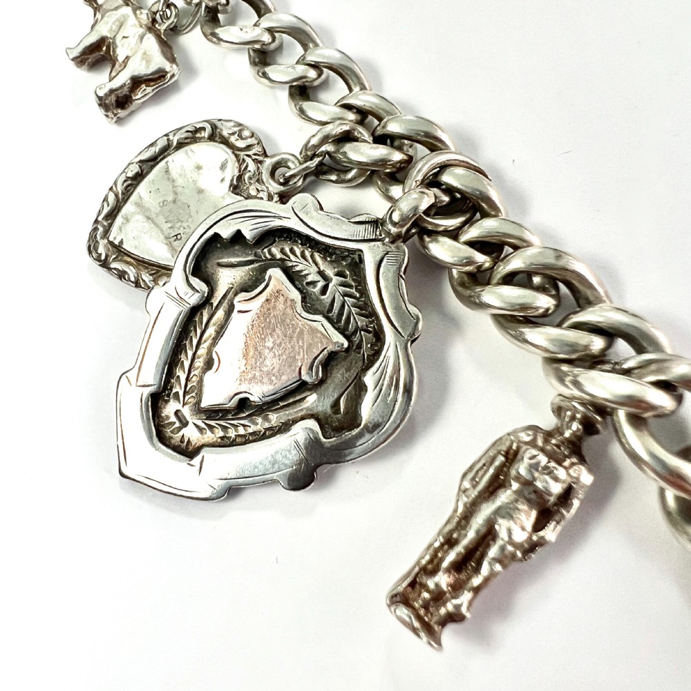Victorian Silver Curb Chain Bracelet with 8 Charms  View VIII