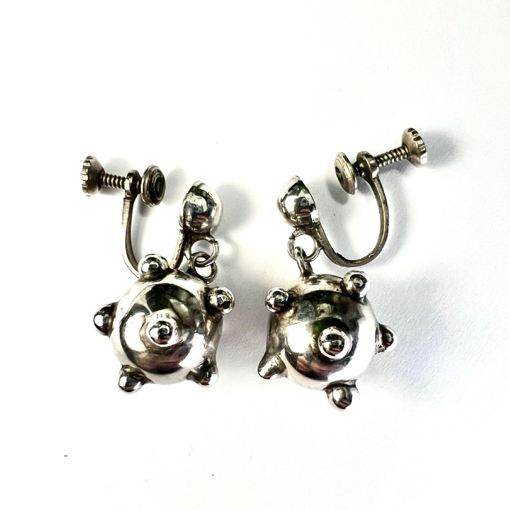 • Vintage Silver Sputnik Screwback Earrings