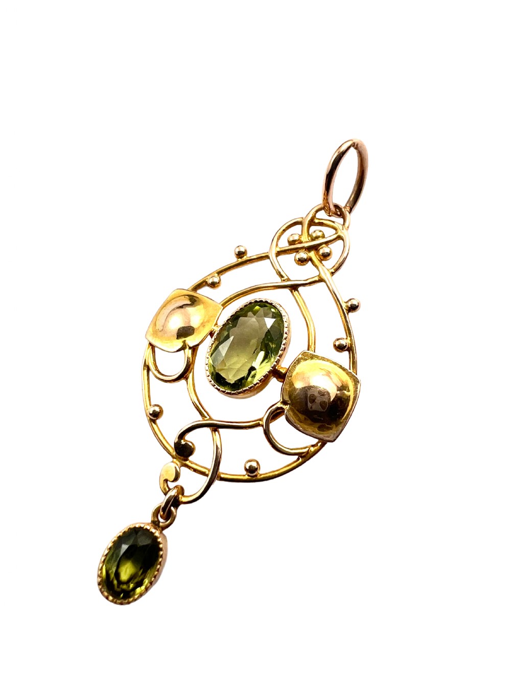 An Edwardian 15ct gold Art Nouveau openwork pendant set with two faceted green peridot gemstones. View III