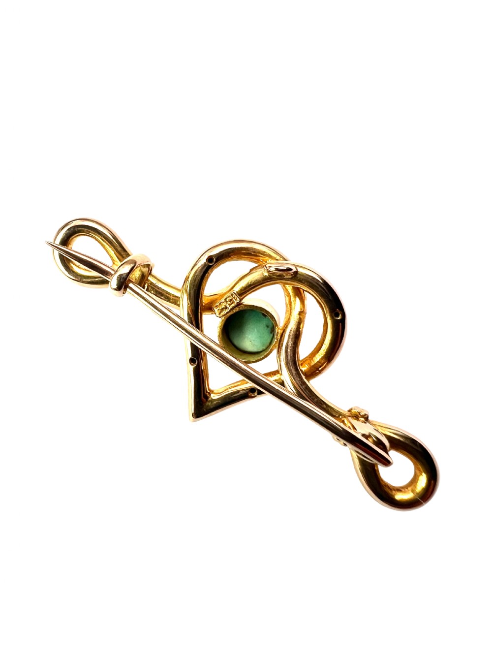 An antique 15ct yellow gold bar brooch featuring a central entwined heart motif set with a round turquoise cabochon stone. View VI
