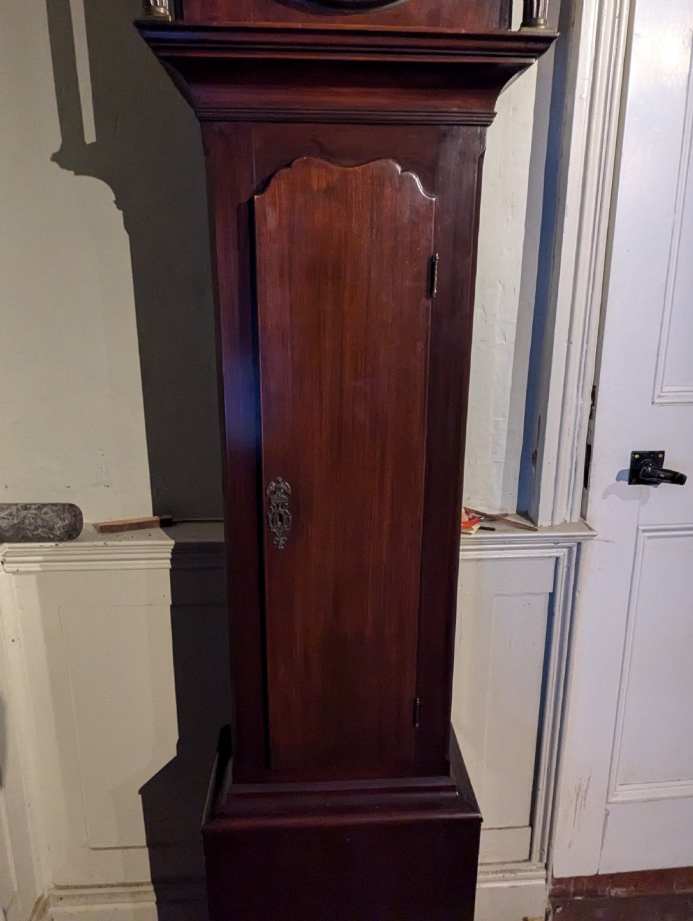 An 18th-century mahogany regulator longcase clock featuring an architectural pediment hood, circular brass dial signed Macpherson Edinb, and fluted columns. View III