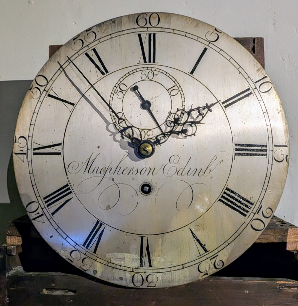 An 18th-century mahogany regulator longcase clock featuring an architectural pediment hood, circular brass dial signed Macpherson Edinb, and fluted columns. View VII