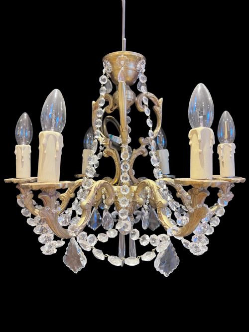 A  Pair of Six Light French Brass and Crystal Chandeliers