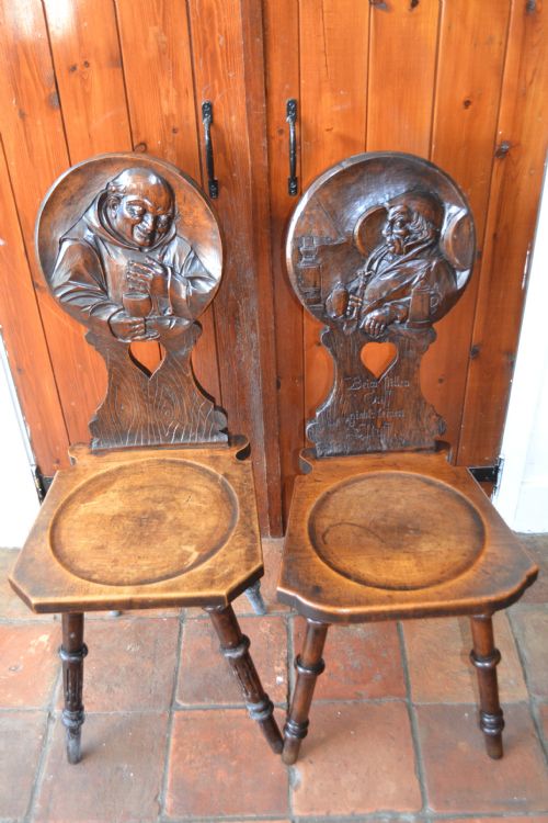 Matched Pair 19th Century Bavarian Chairs, Hand Carved, C1850. Decorated with Ale Quaffing Monk and Pipe Smoker and Inscribed in German/austrian.