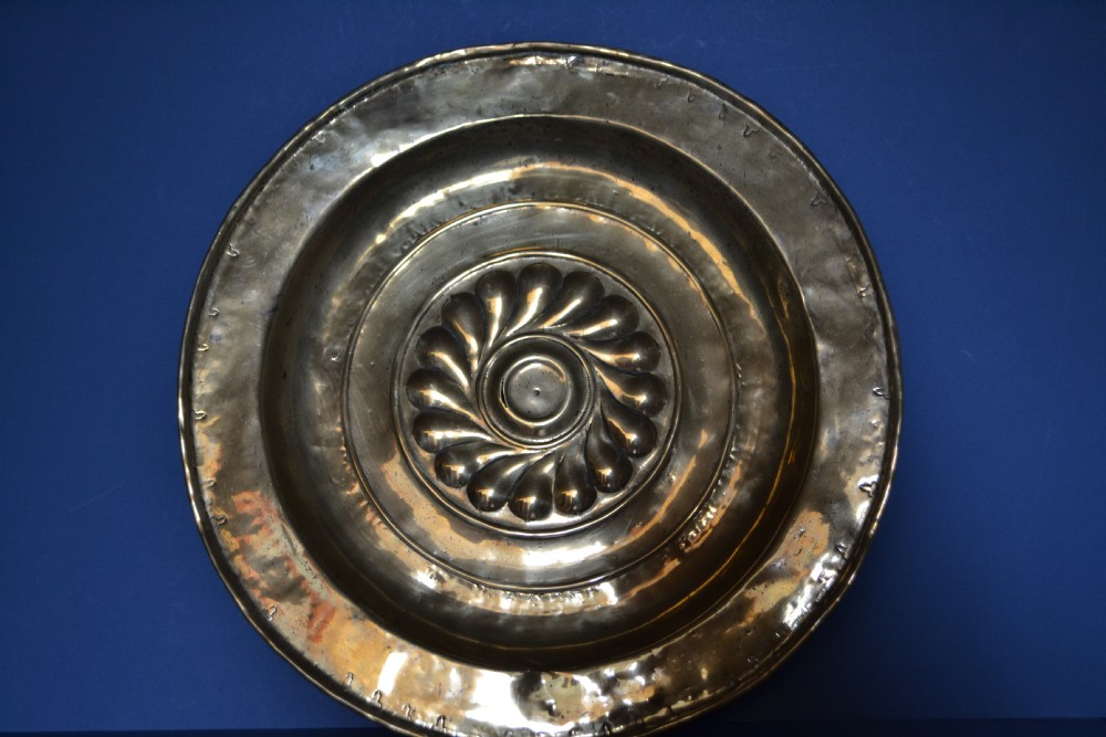16th Century Nurenburg Brass Alms Dish,c1550.Punched and gadrooned decoration.