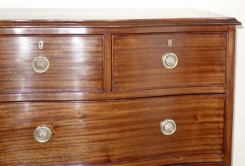 EDWARDIAN SERPENTINE MAHOGANY CHEST OF DRAWERS - ADDITIONAL PHOTO 1