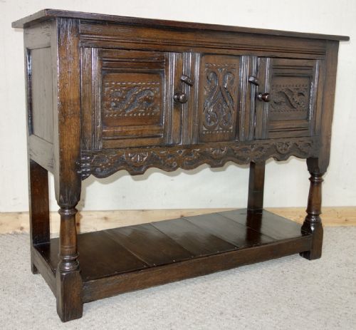 small dark oak carved cupboard - CATEGORY: ANTIQUE SIDEBOARDS - DATED 1920